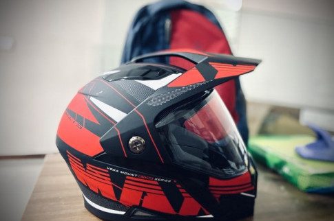 wearing a motorcycle helmet
